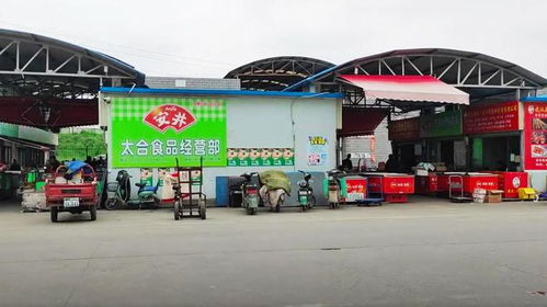 武漢城區有座肉制品超級工廠,內設批發市場,還有專屬鐵路運送